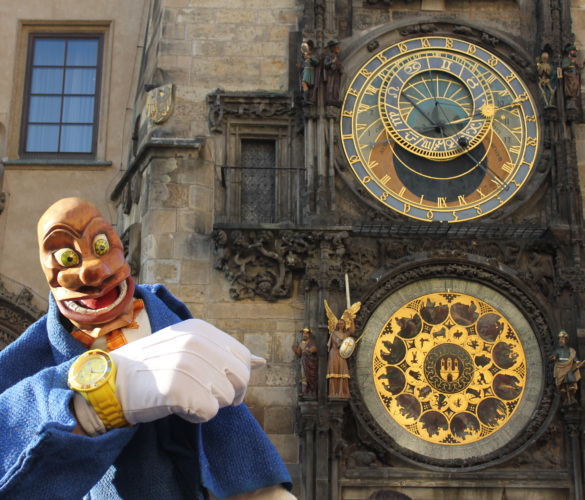 Igor in front of the clock in Prague