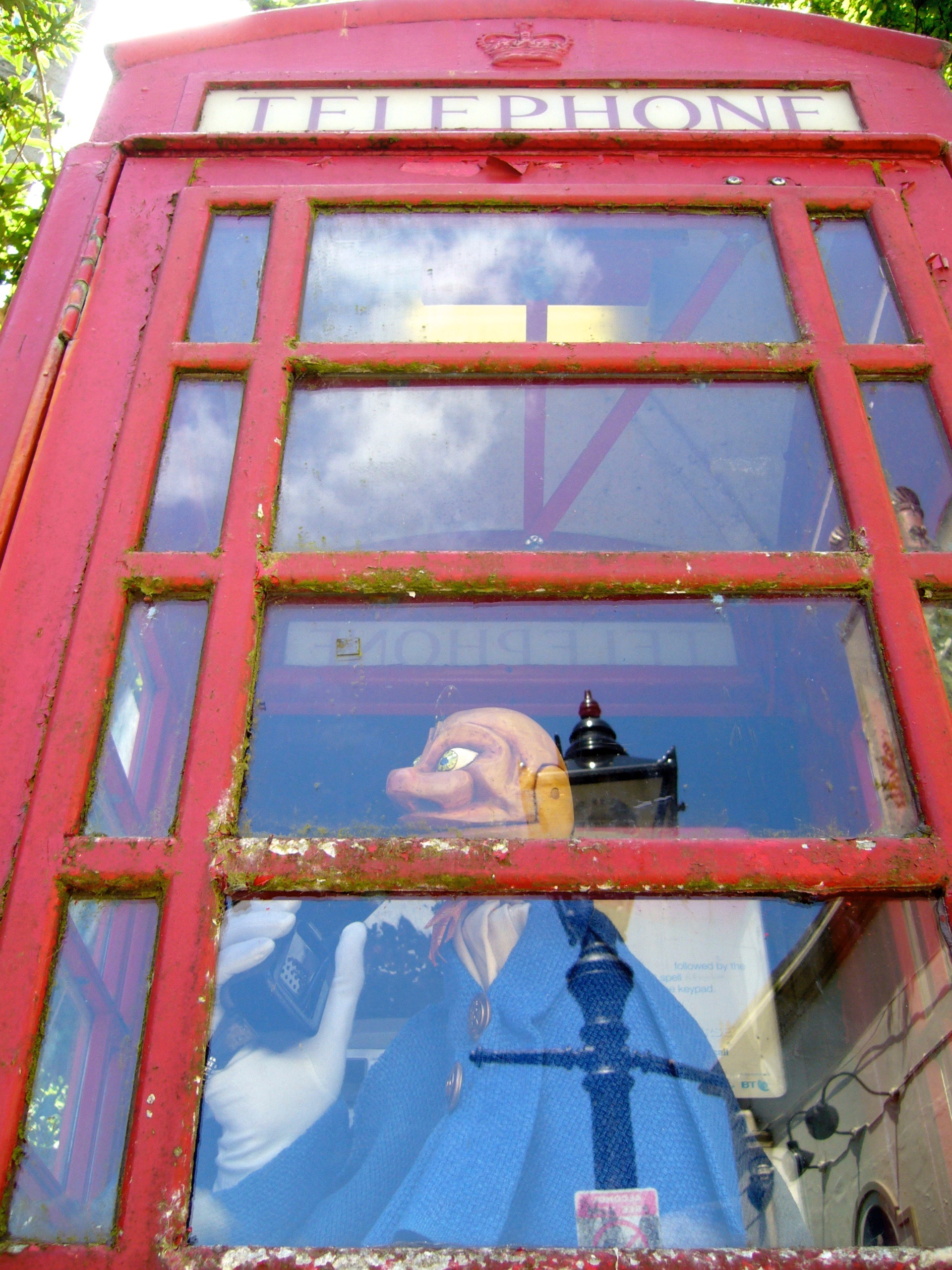 Igor in a phone cabin in England