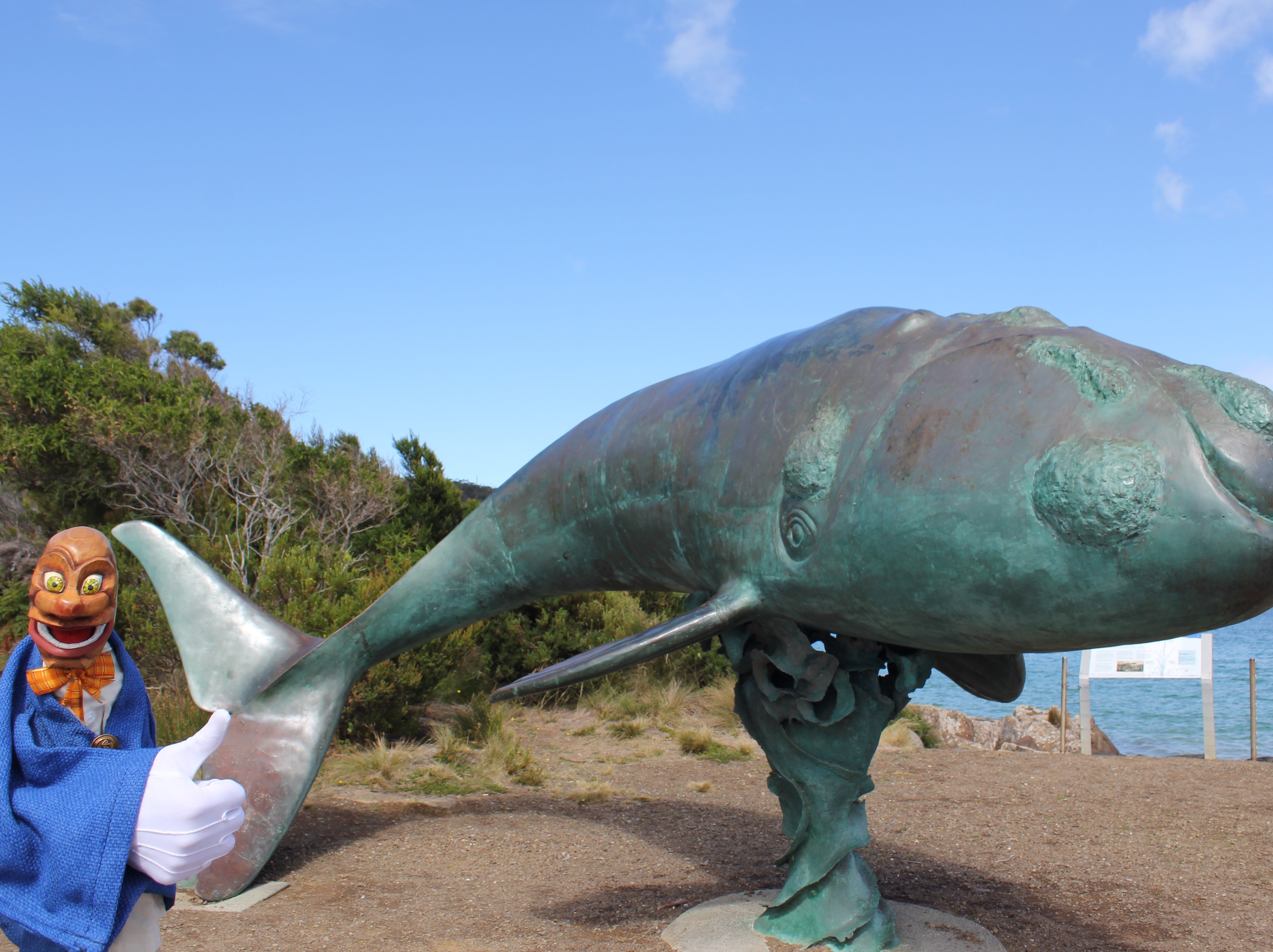 Igor in Cockle Creek in Tasmania in front of the whale sculpture